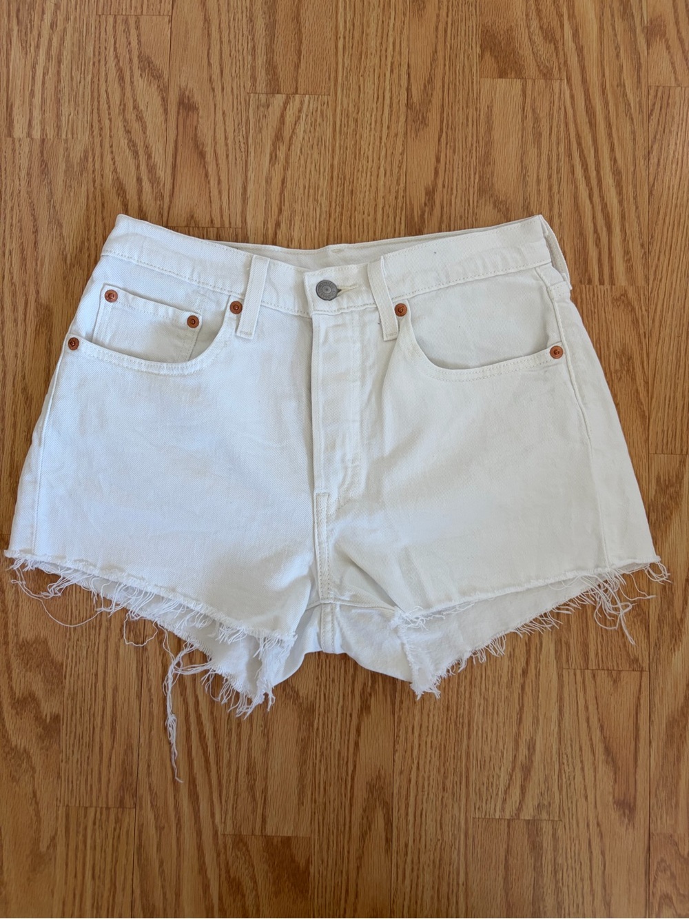 Levi's White Denim Cutoff Shorts with Frayed Hem